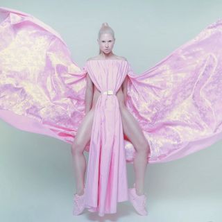 CELESTIAL ROSE DRESS Description The Celestial Rose Dress is a couture phenomenon a rose blooming inside a gravitational...